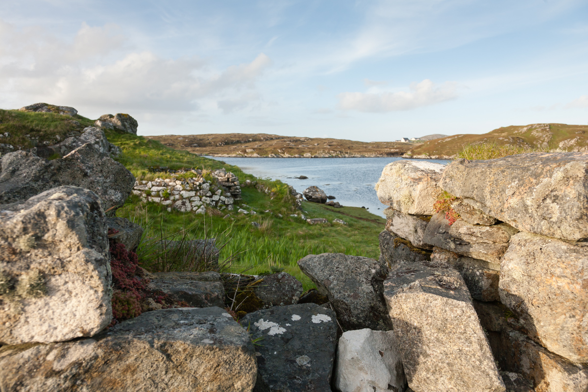 View from a ruined Blackhouse in the island of Barra. Visible is the remains of the window and the foreshore of the beach.