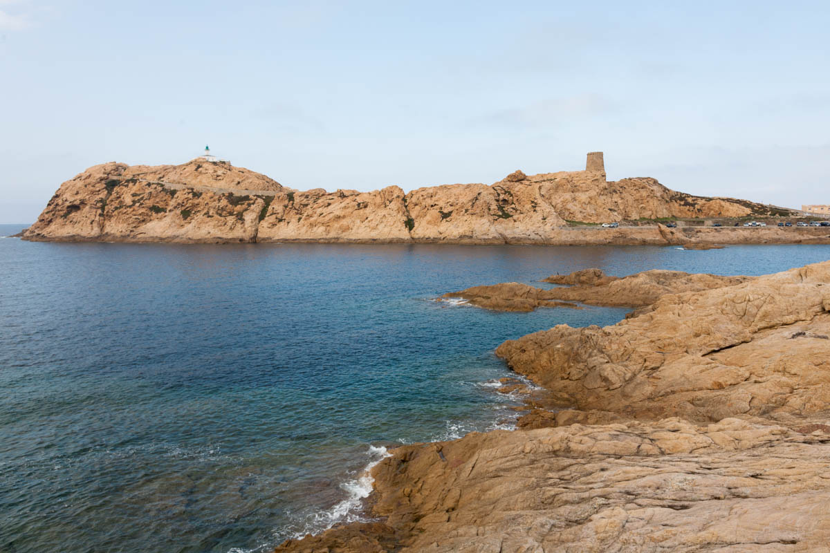 Looking across the bay and rocky foreshore to L'Île Rousse.